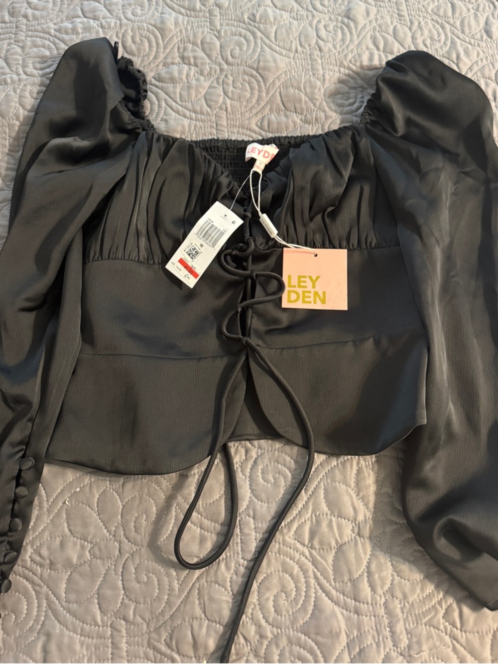 Leyden Black Puff Sleeve Lace-Up Long sleeve top. NWT. Size M